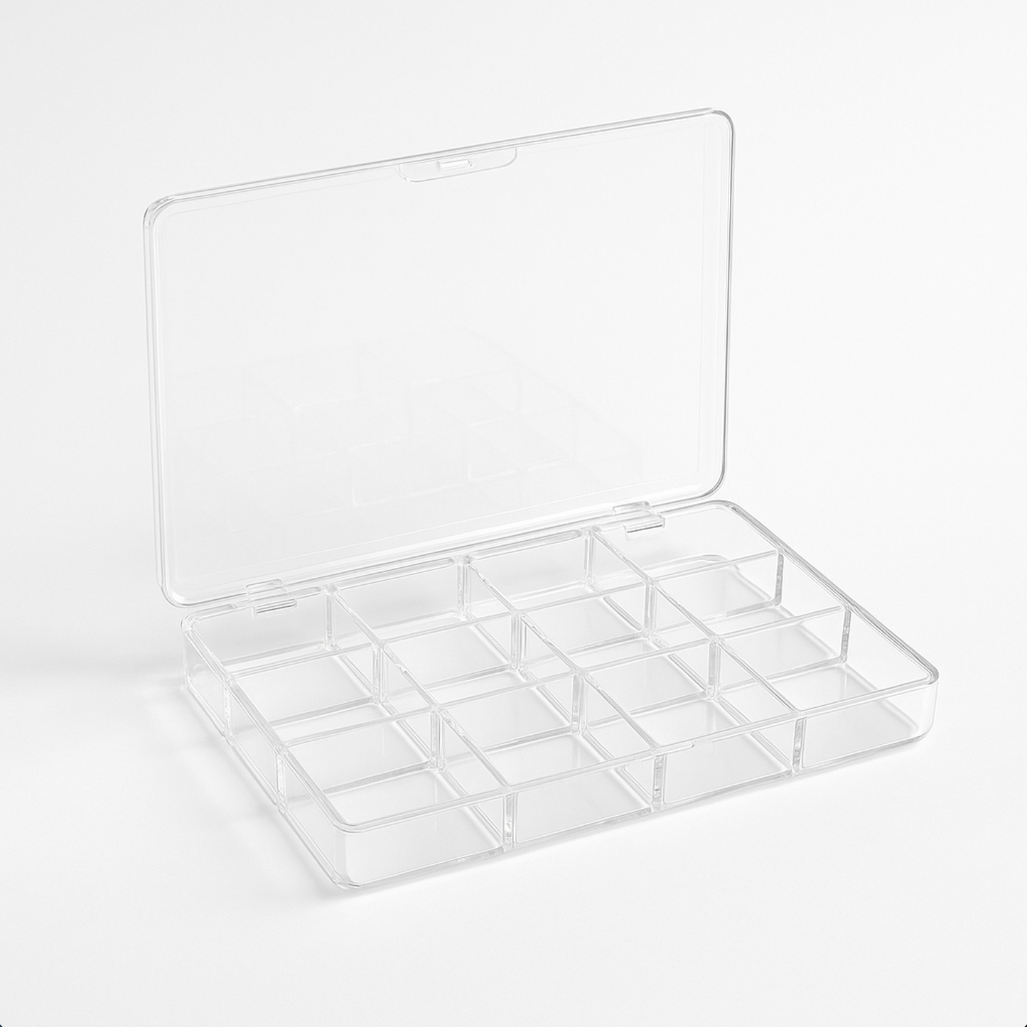 Clear plastic organizer with multiple compartments on a white background