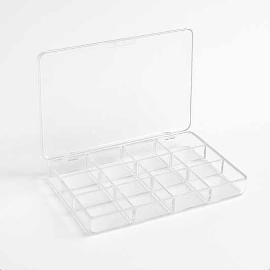 Clear plastic organizer with multiple compartments on a white background